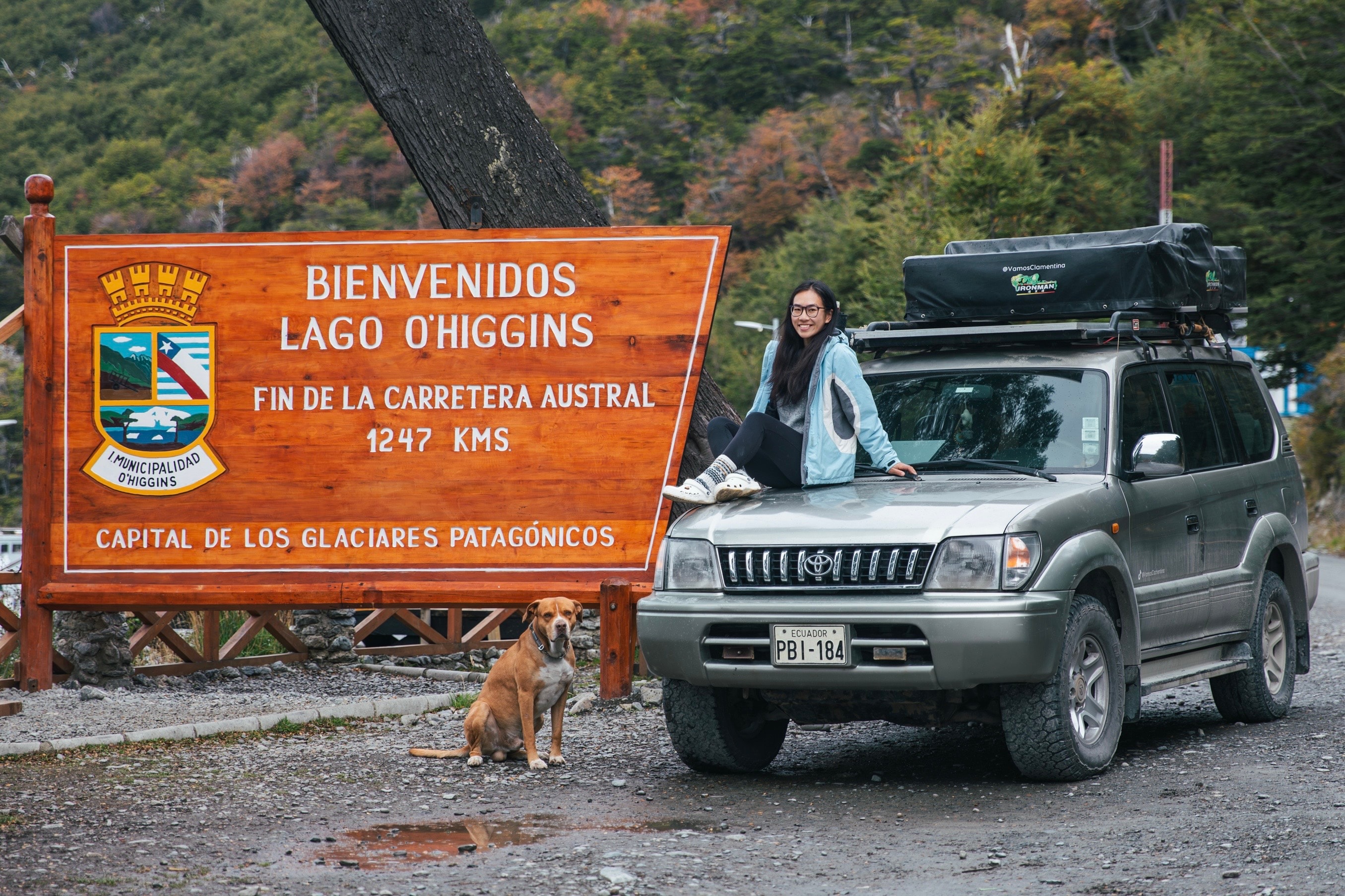 Yirong on the hood of Clamentina at Lago O'Higgins, the end of the Carretera Austral